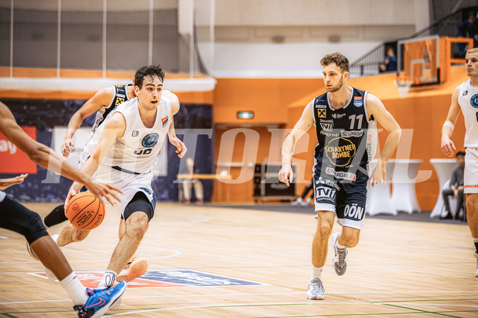 Basketball, Win2Day Superliga 2022/23, Grunddurchgang 8.Runde, Vienna Timberwolves, Gmunden Swans, Paul Rotter (66), Lukas Schartmüller (11)