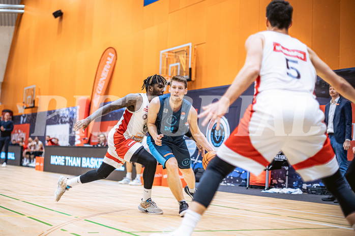 Basketball, Win2Day Superliga 2022/23, Grunddurchgang 6.Runde, Vienna D.C. Timberwolves, BC GGMT Vienna, Jahenns Manigat (21), Jonas John (99)
