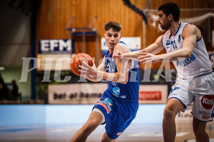 Basketball, bet-at-home Basketball Superliga 2021/22, Grunddurchgang Runde 14, Oberwart Gunners, Vienna D.C. Timberwolves, Jakob Lohr (12)